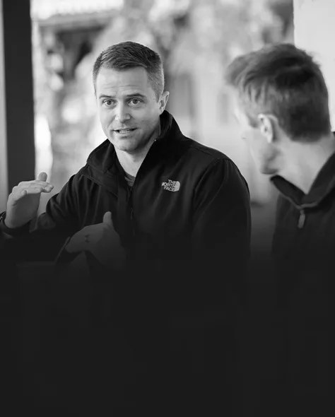 No Cants members in conversation at an event